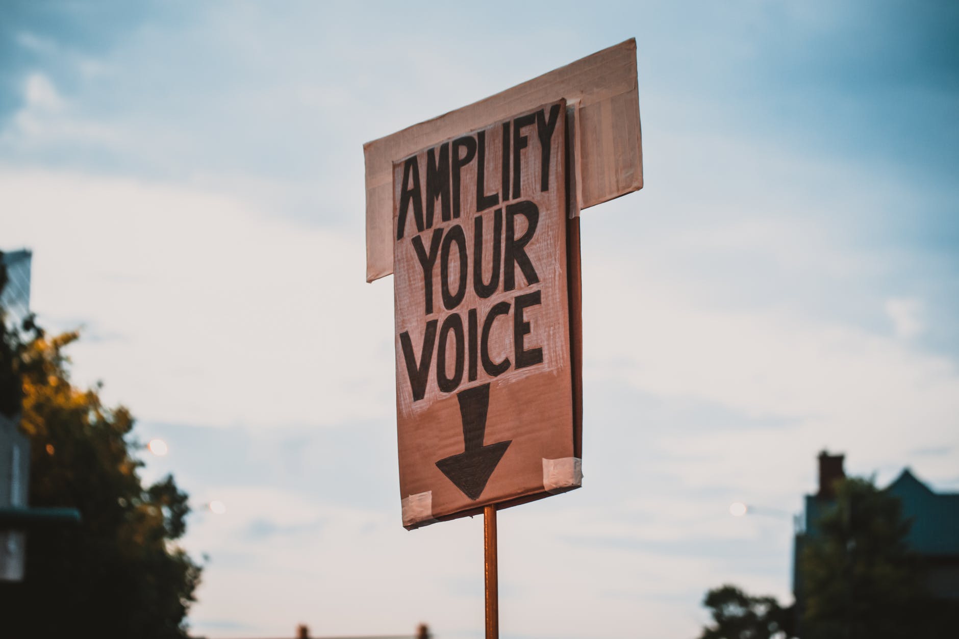 sign with amplify your voice during protest